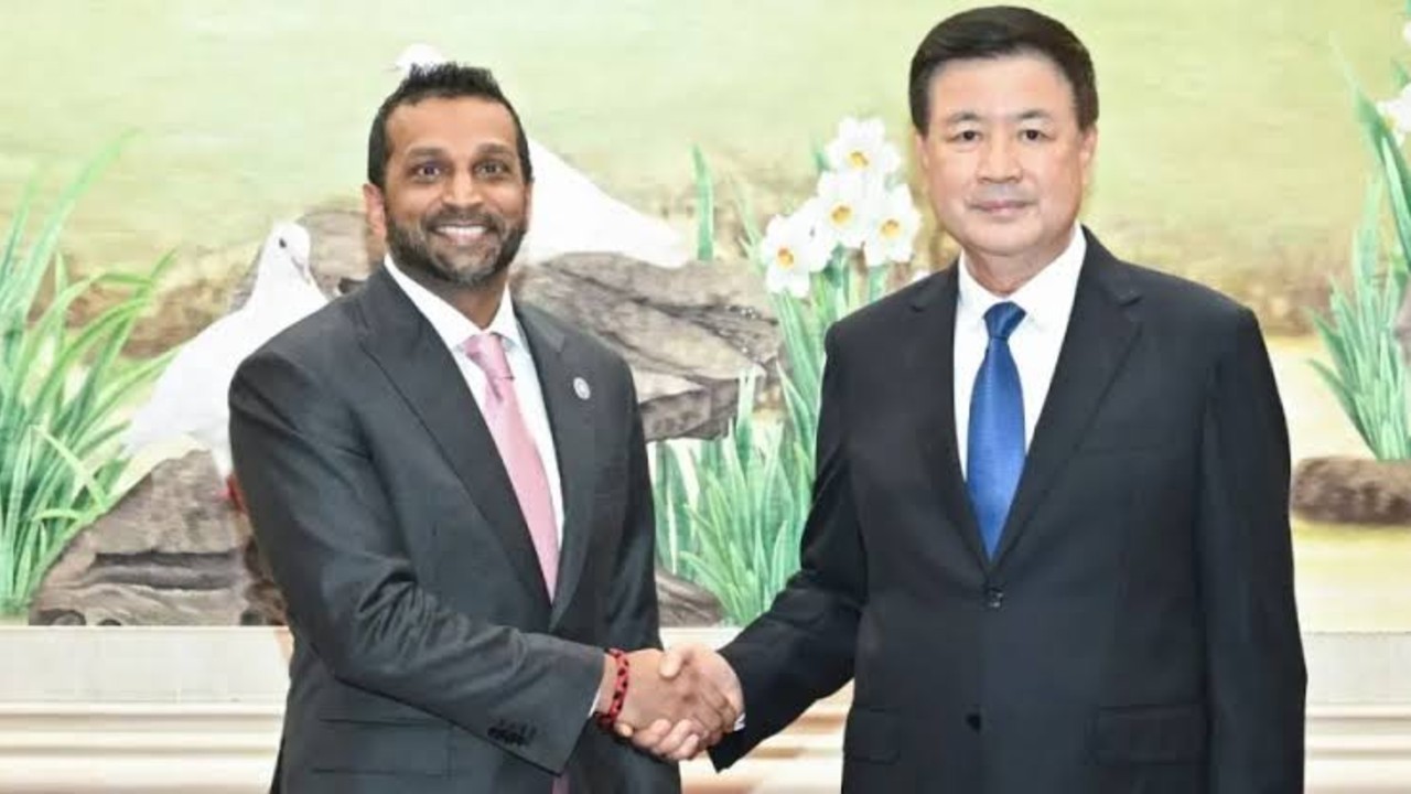 王小洪会见FBI局长帕特尔