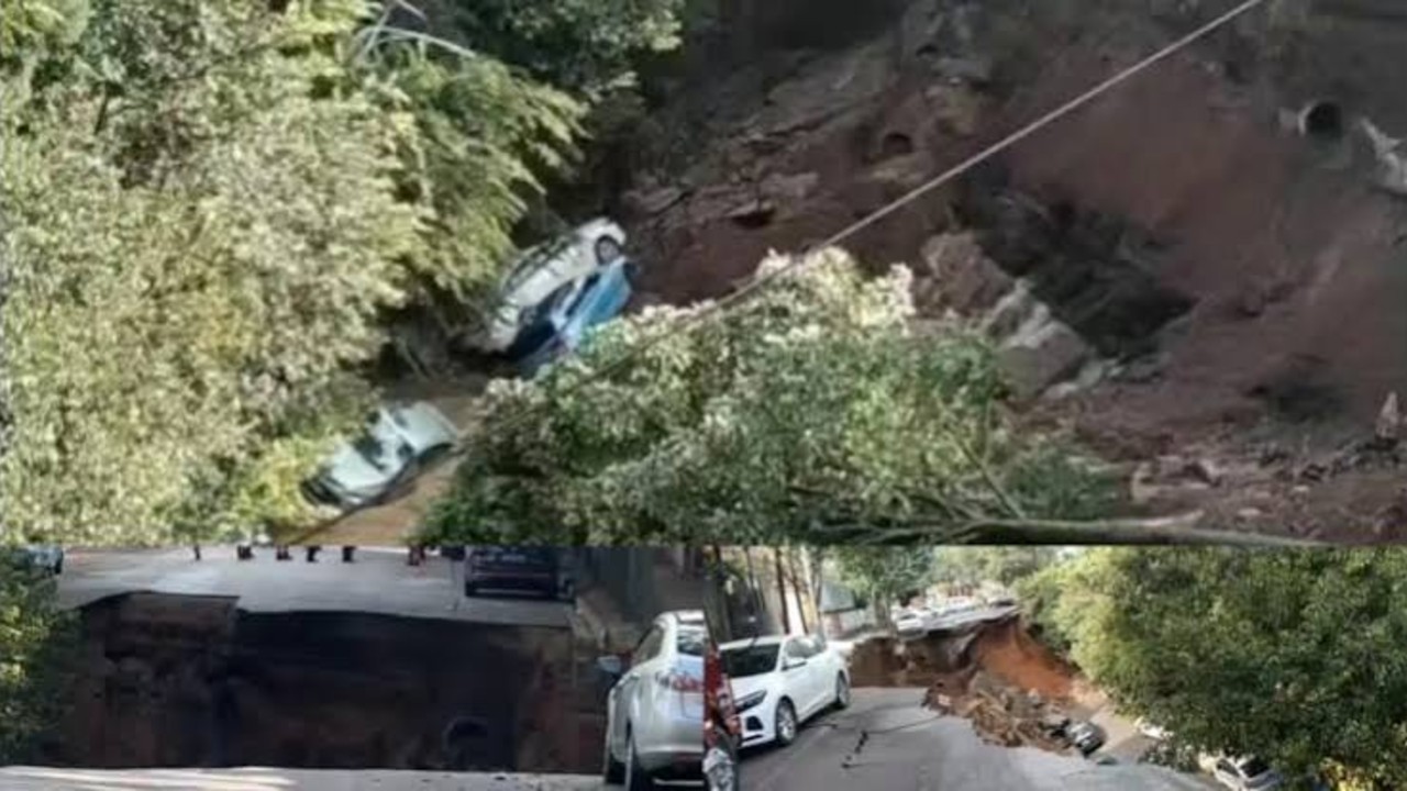 昆明一地道路塌方 多车掉落坑中